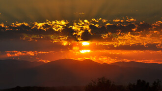 Hazy crazy sunrise clouds