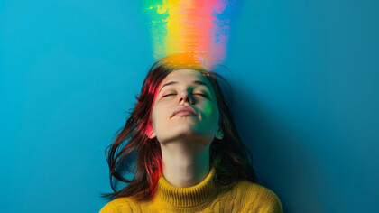 A portrait of a person surrounded by rainbow colors symbolizes synesthesia, blending abstract perception, colorful visualizations, sensory overlap, and intricate neural connections