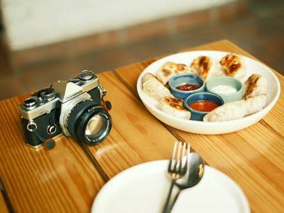 A vibrant display of momos on a table, highlighting a beloved dish from Nepal