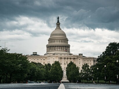 A foreboding sky hanging over the Capitol, reflecting the nation's search for moral and political renewal