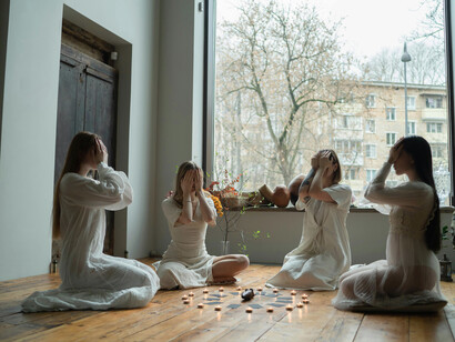 Meditation becomes a portal to manifestation as the group breathes deeply, releasing blocks and inviting abundance into their lives