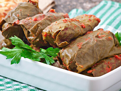 Yaprak sarma, the iconic Turkish stuffed grape leaves, combine tender grape leaves with a fragrant rice filling, embodying the timeless flavors and traditions of Turkish cooking