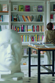 In a sanctuary of knowledge, she delves into the art of questioning assumptions, sharpening her critical thinking skills