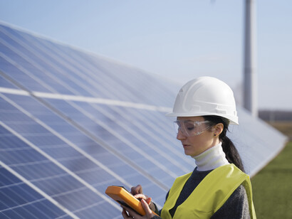 An expert analyzing the power of solar panels