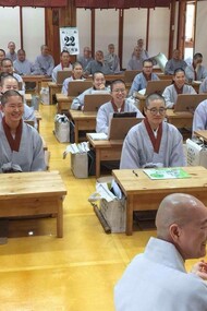 Korean Monastery with people smiling and looking happy