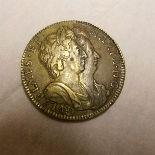 Coins and Manuscripts. Courtesy of Blackburn Museum