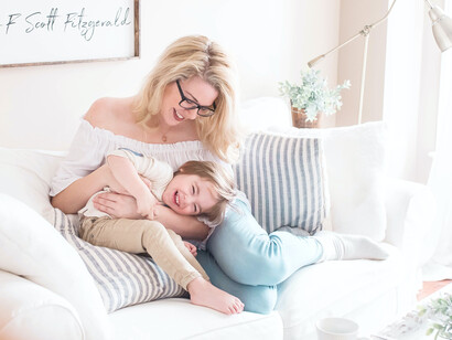 A mother and child bonding and laughing together