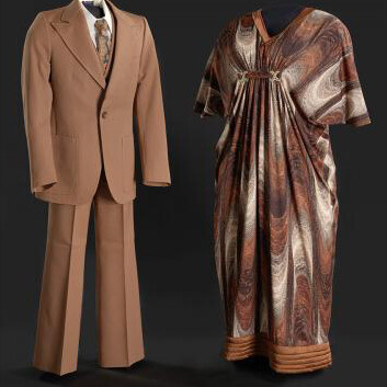 Suit worn by Sherman Hemsley as George Jefferson and dress worn by Isabel Sanford as Louise Jefferson on The Jeffersons, 1979