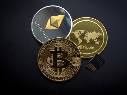 Bitcoins, Ethereum and Ripple cryptocurrencies 