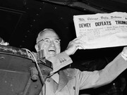 President Harry Truman, a Democrat, holds up the Republican-leaning Chicago Daily Tribune newspaper which falsely stated that Truman lost the US presidential election to Dewey