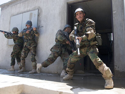 Afghan National Army recruits participate in an urban warfare training exercise at the Kabul Military Training Center, Afghanistan