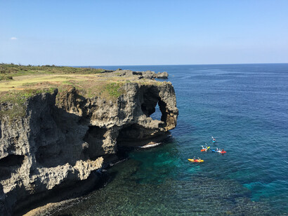 Kyakers off the bluff in Okinawa, Japan, a blue zone region
