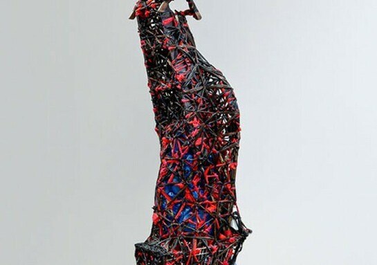 Nari Ward Savior, 1996, Plastic garbage bags, cloth, bottles, shopping cart, metal fence, earth, wheel, mirror, chair, and clocks. 128 x 36 x 23 inches, Installation view: Nerman Museum of Contemporary Art, Overland Park, Kansas, Image courtesy the artist and Lehmann Maupin, New York, and Hong Kong