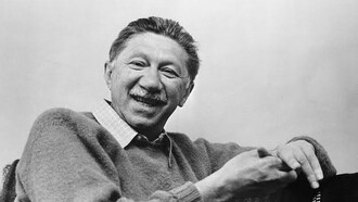 Abraham Maslow, smiling at the camera