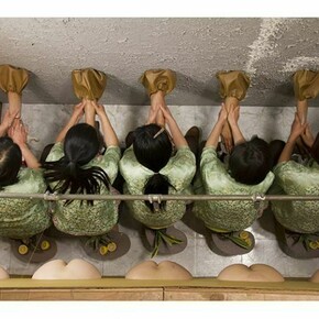 Still from: Mika Rottenberg, Squeeze, 2010, Single channel video installation and digital C-print, Duration: 20 min. Dimensions variable, Edition of 6 + 2 AP © Mika Rottenberg. Courtesy the artist and Andrea Rosen Gallery, New York.