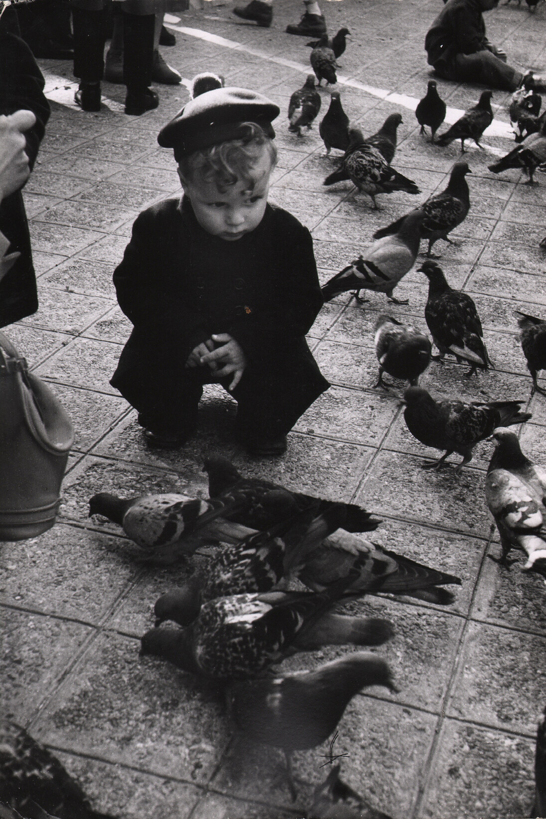 Ernst Haas, Child, London, 1951. Vintage silver gelatin print. Estate stamp on print verso. 9.5 x 13.5 inches © Ernst Haas, courtesy Atlas Gallery