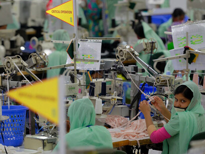 Garment workers are pictured at work in a local clothing factory in Bangladesh, photo: Marcel Crozet, International Labour Organization