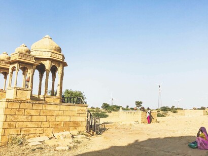 A woman looks on at the more modest of creations at Bada Bagh Jaisalmer, India