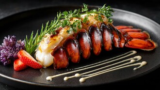 Lobster tail prepared as a premium culinary experience, symbolising the social prestige attached to certain foods
