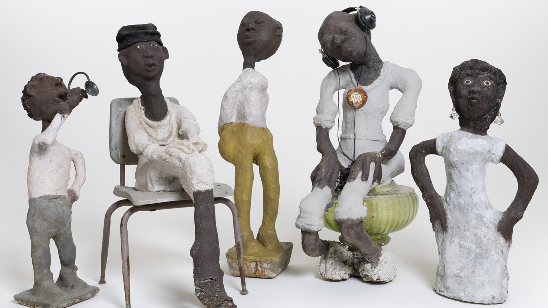 (from left) Horn Player: Louis Armstrong Series, c. 1985–c. 1999; concrete, paint, and mixed media; 32 3/4 x 9 1/2 x 13 1/2 in. Rosa Parks, c. 1985–c. 1999; concrete, paint, and mixed media; 40 x 18 3/4 x 29 in. untitled, c. 1985–c. 1999; concrete, paint, and mixed media; 44 1/2 x 9 1/2 x 12 in. Issues, c. 1985–c. 1999; concrete, paint, and mixed media; 46 x 18 x 25 in. Woman with Fancy Earrings, c. 1985–c. 1999; concrete, paint, and mixed media; 36 x 18 x 10 in. John Michael Kohler Arts Center Collection, gift of Kohler Foundation Inc. 
Photo courtesy of John Michael Kohler Arts Center 
