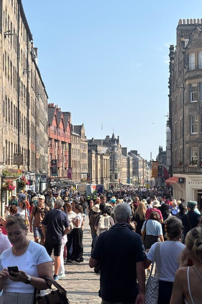 The Royal Mile is a series of streets forming the main thoroughfare of the Old Town of Edinburgh, Scotland
