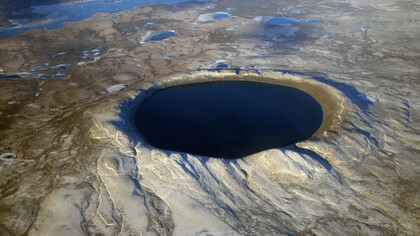 Un cratere originato dalla caduta di un meteorite © NASA Denis Sarrazin