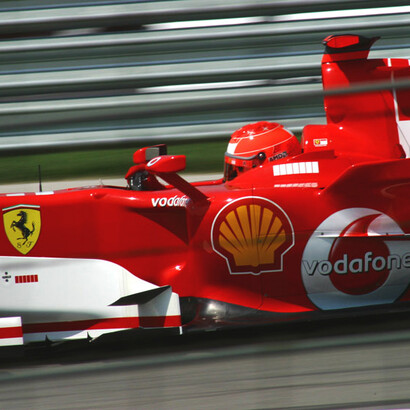 Michael Schumacher dirigindo pela Ferrari no Grande Prêmio dos Estados Unidos de 2006