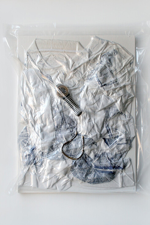 Nude 2007, clothes, shoes and accessories in under-vacuum, plastic, wood, enamel, plexiglass, cm 50x60x7 cad. 
