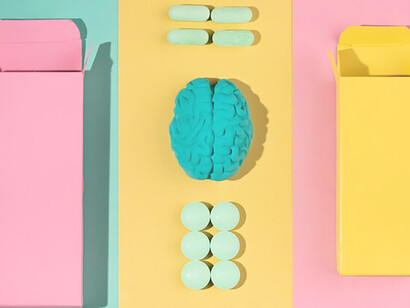 Assortment of brain-boosting pills emphasizing dopamine and motivation