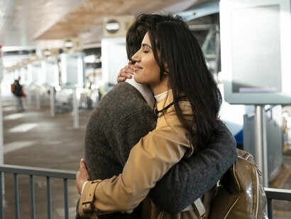 A final embrace before going their separate ways, torn between a beloved career and the prospect of love
