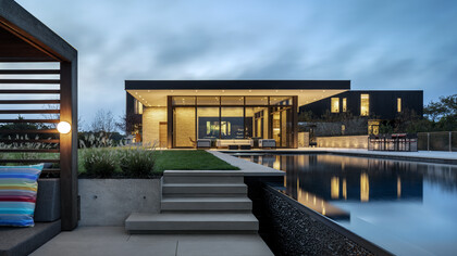 Exterior by Architecture Plus Information (A+I) with Karen Pearse Global Direct. The poolside walkway is paved in sandblasted Ravenna marble from Italy. Photo by Magda Biernat
