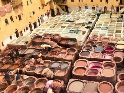 The dye-filled vats of Fez’s tanneries, representing the city’s craft traditions