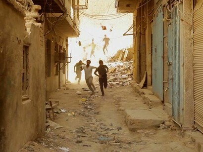 Hareth Alhomaam, Buzz, 2012, video, 10’, 6. Akeel Khreef , 2012, woollen rug on metal generator frame, 90 x 60 x 40 cm, courtesy of the artist and RUYA Foundation