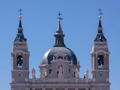 In the heart of Madrid, Spain, the majestic Catedral de la Almudena reflects the harmonious blend of old-world Gothic beauty and the dynamic pulse of modern Latin American culture
