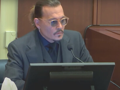 Johnny Depp speaking in the courtroom at the Fairfax County Circuit Court in Fairfax, Virginia