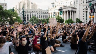 Activists battle against the corporate giants, advocating for social economic justice, fighting against the interests of economic elites
