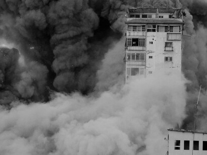 Smoke and flames billow after Israeli forces struck a high-rise tower in Gaza