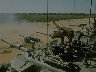 During the Yom Kippur war on october 13, 1973, idf centurion tanks are captured in a firing line, illustrating historic military action