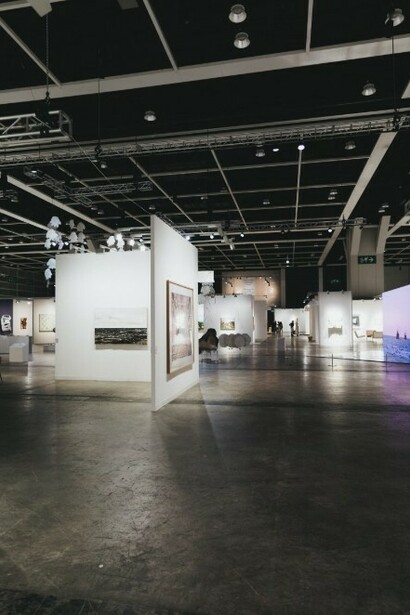 At Art Basel Hong Kong 2025, a vibrant collection of artworks from various artists is displayed, offering a unique cultural experience