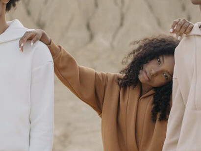 The beauty of minimalism shines through in this outfit, where a muted beige palette and sleek design create a polished and serene aesthetic