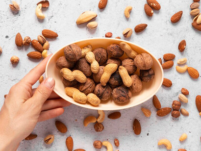 A flat lay of nuts showcasing magnesium sources that enhance sleep quality and support the gut-brain axis