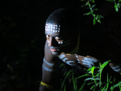 A fantasy warrior from Africa with a painted skull mask