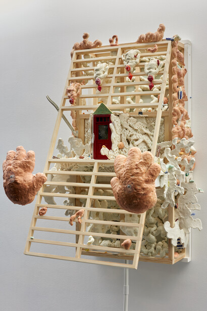 Kara Chin, Bread Hands House, 2021. Timber, acrylic/oil/wall paint, expandable foam, salt dough, filler, furniture lacquer. printed card, paper, Perspex, dolls house objects and door, LED strip lights, metal brackets, glazed ceramic. 113 x 80 x 65 cm.

