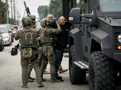 Heavily armed federal officers sweep neighborhoods, making constitutional rights feel optional