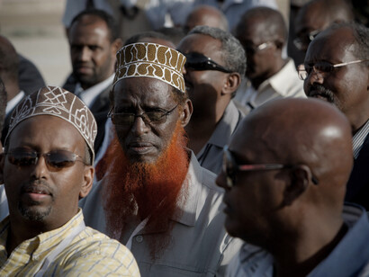 Their weathered faces, marked by years of experience, speaks to the deep cultural significance of proverbs in Somali storytelling and daily life