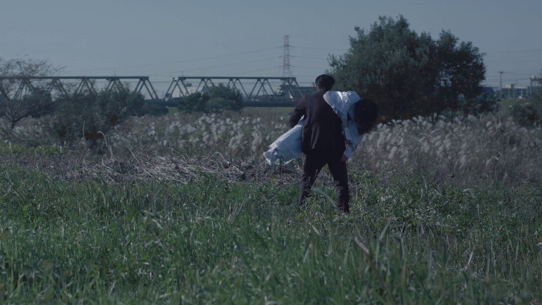 Performing Kaoru's funeral 