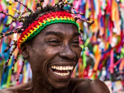 Smiling Jamaican man portrait, candid Jamaican people street photography