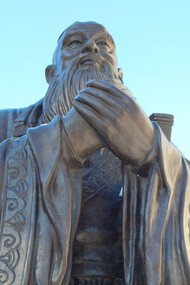 A statue in China of social philosopher Confucius, who centered on maintaining healthy relationships in family and society, all based on respect