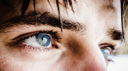 His eyes reminder her of the ocean, sometimes blue and sometimes green