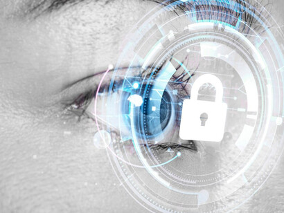 A woman’s eye with a smart contact lens, illustrating biometric security technology and facial recognition